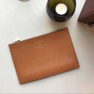 Never used Kate Spade Madison Ave zippered pouch